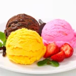 Ice cream scoops in chocolate, mango, and strawberry flavors, with fresh strawberries and mint, highlighting the Ice Cream Recall issue.